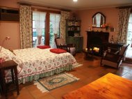 Bedroom with open fire