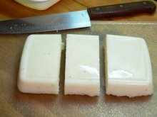 Fried-Grits_05_grits-sliced Southern Fried Grits, slice the grits.