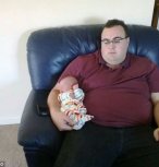Weighing in at 25st 9lb at size 6XL and a 48in waist Brendan, pictured cuddling a friend's baby, decided to tackle his diet
