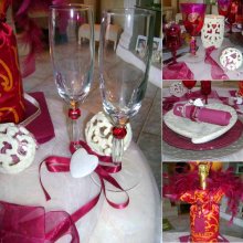 wine glasses decorated with pink ribbons